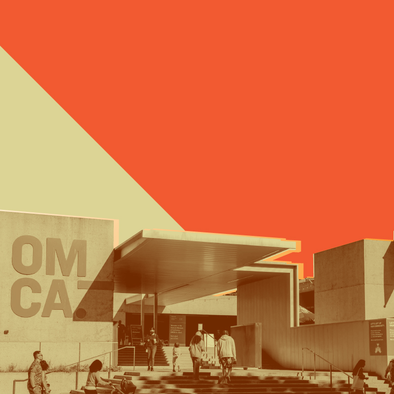 The exterior of OMCA with an orange sky.